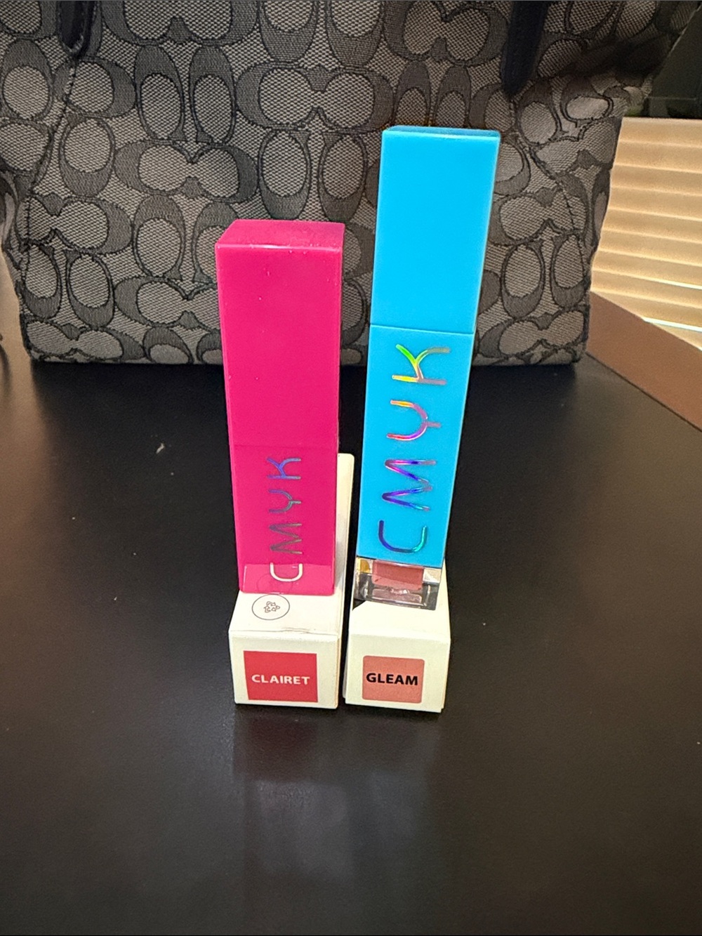 CMYK lip gloss and lipstick